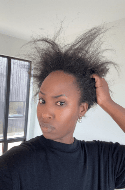 Founder experiencing hair frustration